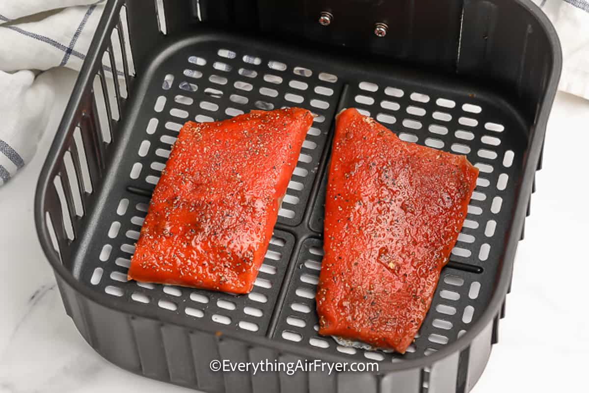 Salmon in an air fryer basket