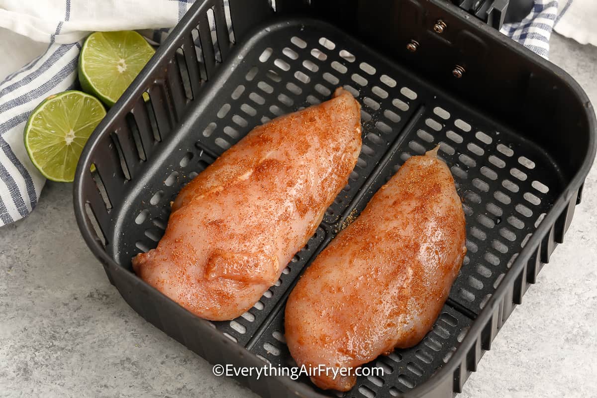 Southwest seasoned chicken in an air fryer basket
