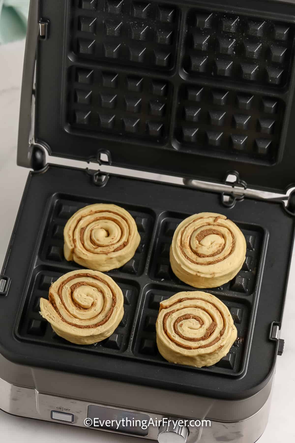 Premade Cinnamon Rolls on a waffle maker