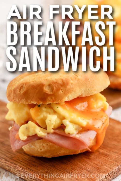 air fryer breakfast sandwich on a cutting board with text