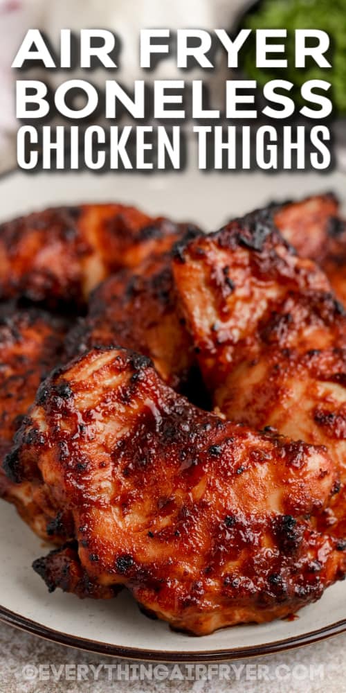 bbq boneless chicken thighs on a plate with text