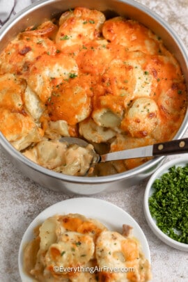 dish and plate of au gratin potatoes