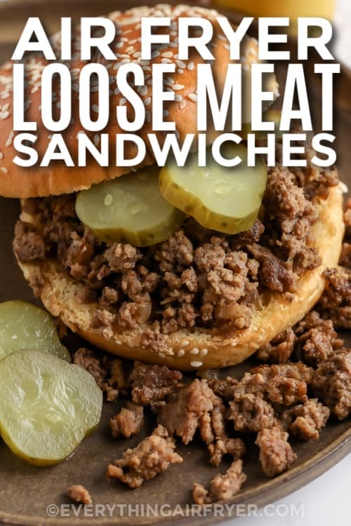 loose meat sandwich with pickles with text