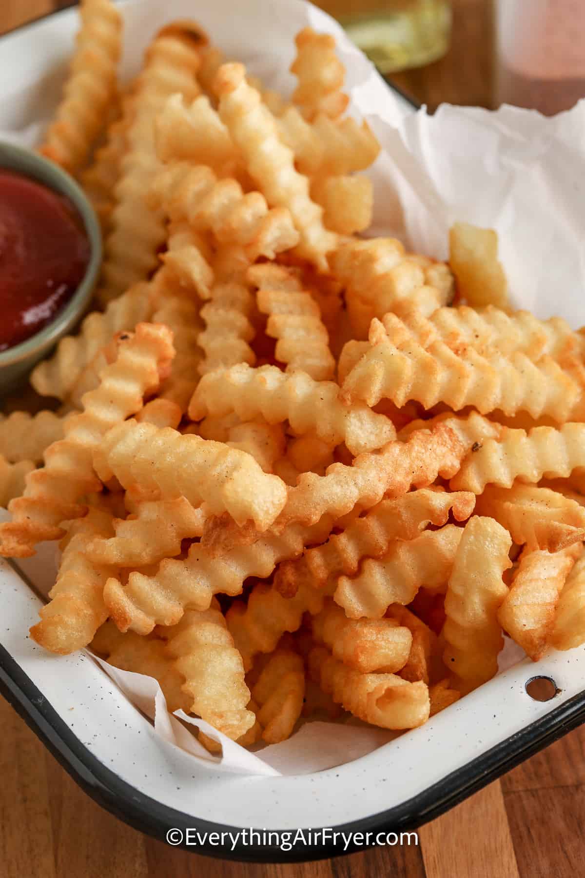 crinkle cut fries in a dish