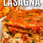 slice of Air Fryer Zucchini Lasagna on a plate with writing