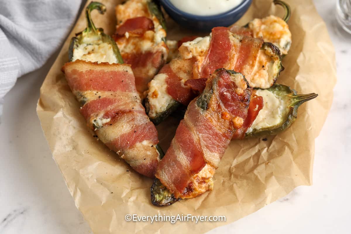 bacon wrapped jalapeno poppers in a bowl
