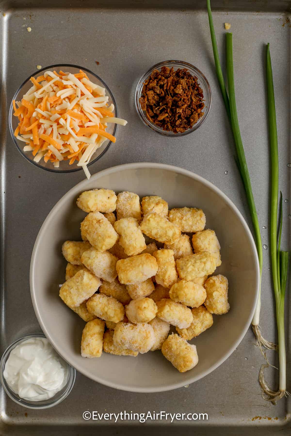 ingredients assembled to make air fryer loaded tator tots