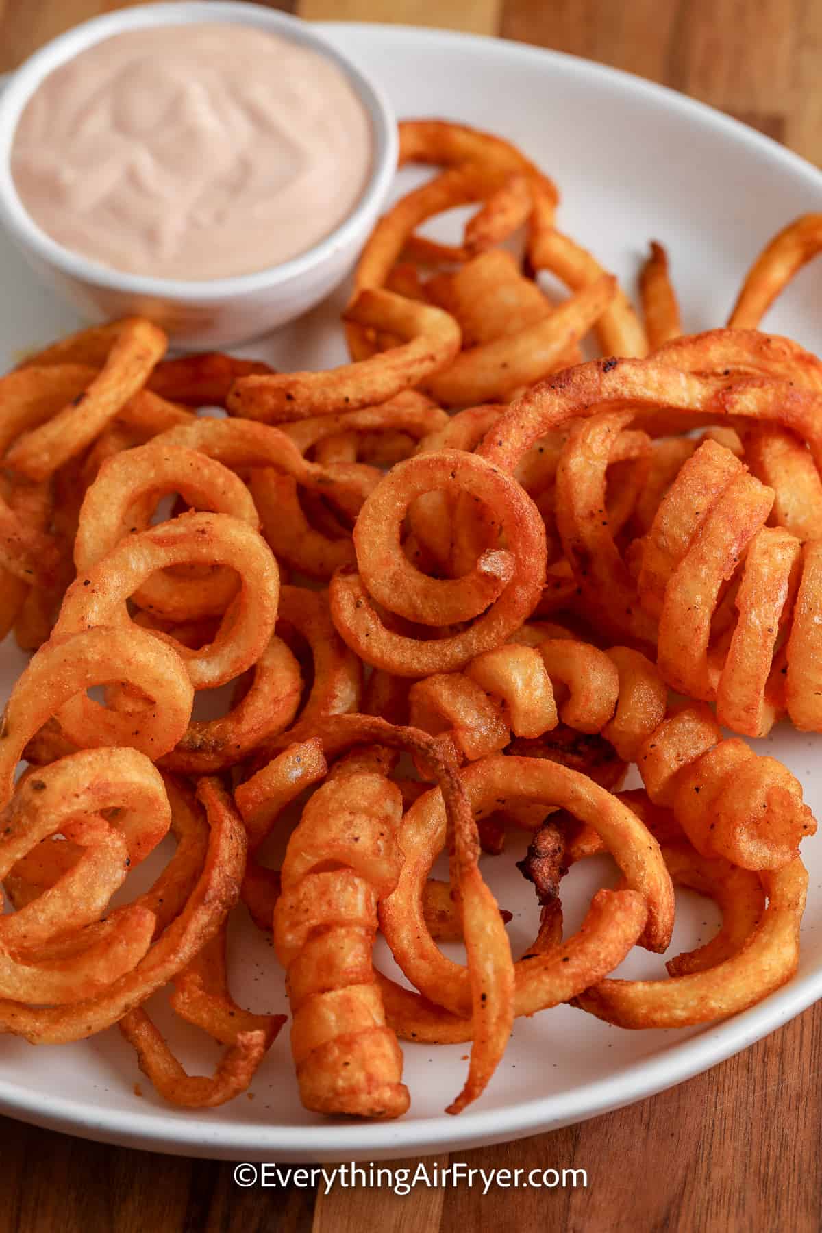 air fryer curly fries on a plate
