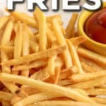 fries on a plate with ketchup