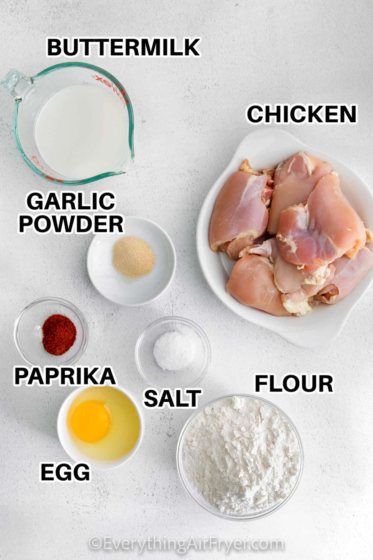 buttermilk, chicken , garlic powder , salt , flour , paprika and eggs with labels to make Air Fryer Chicken and Waffles
