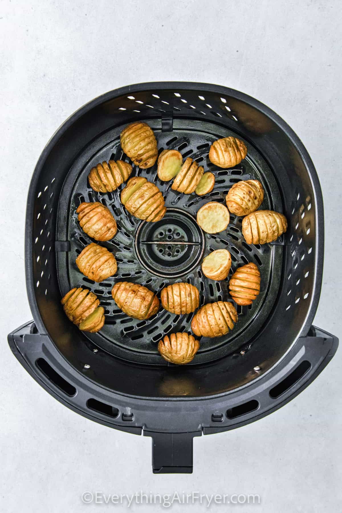 Mini Air Fryer Hasselback Potatoes in the fryer cooked