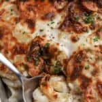 spoon scooping air fryer scalloped potatoes with text