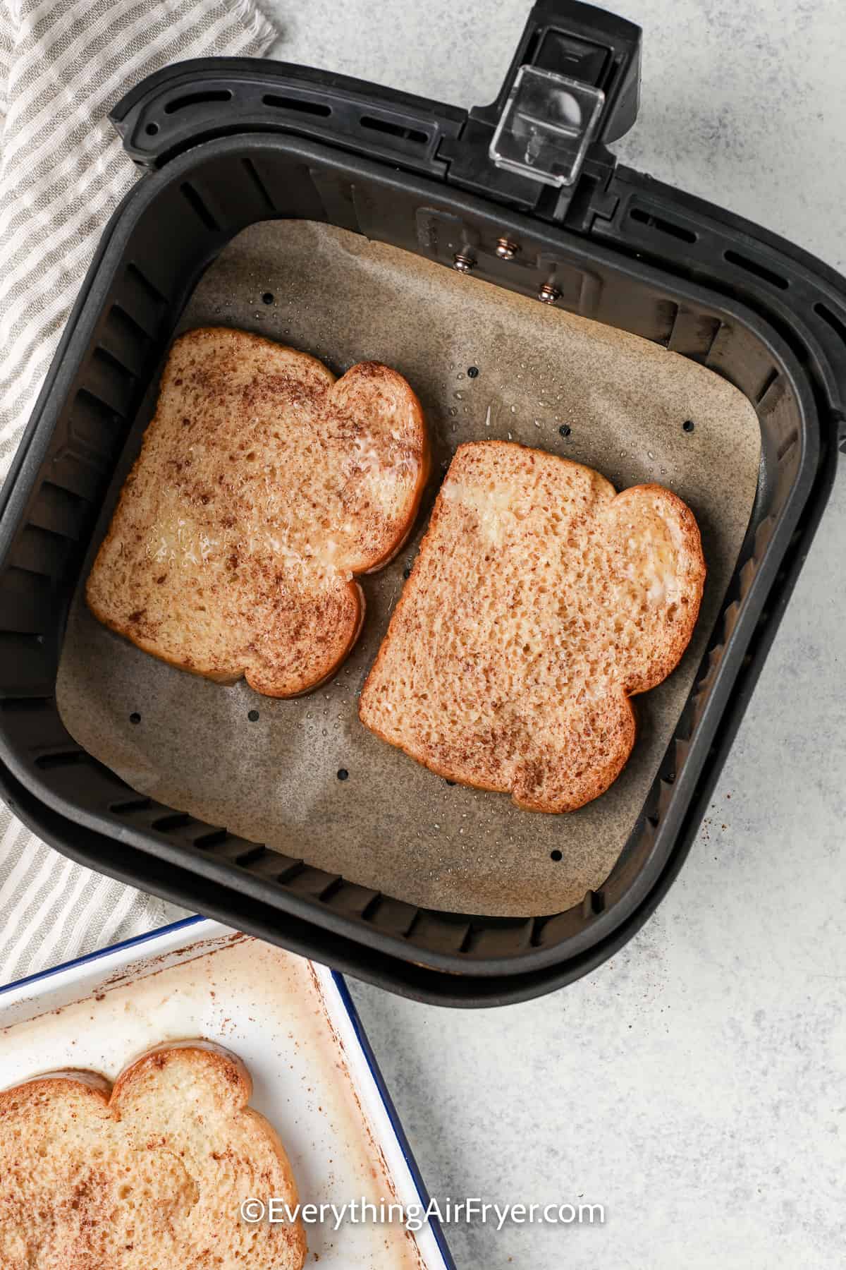 air fryer french toast in an air fryer tray