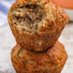 Air Fryer Banana Muffins with a bite taken out of one