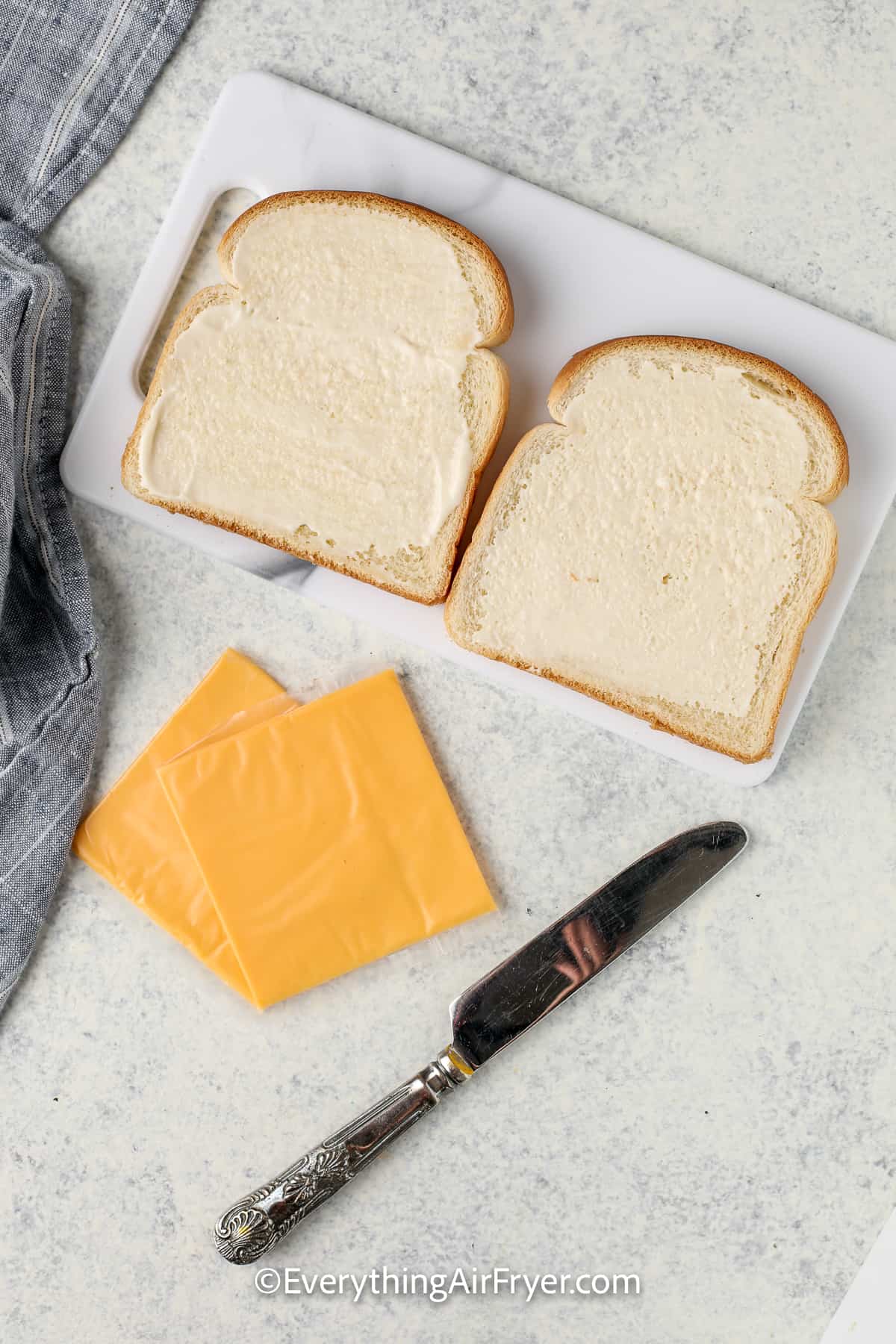mayonnaise spread onto bread