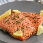 air fryer salmon with dill on a plate