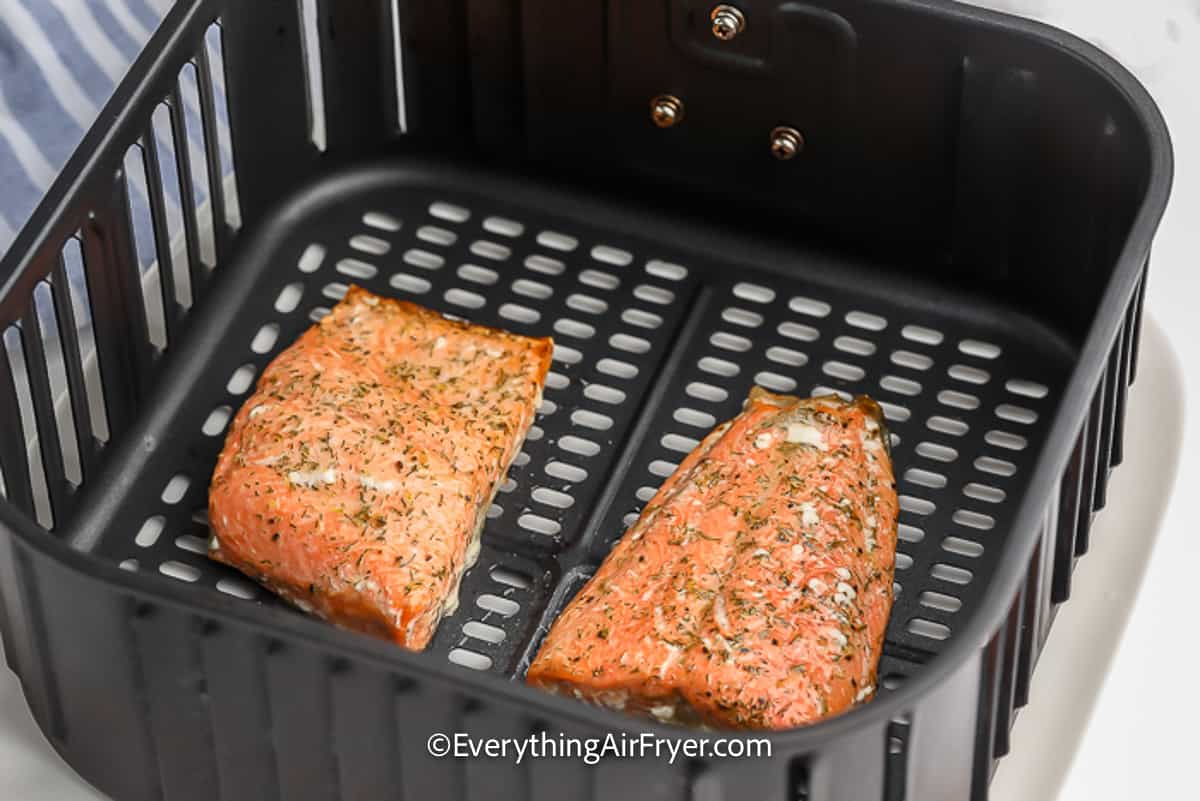 air fryer salmon with dill in an air fryer tray