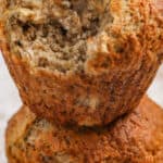 Air Fryer Banana Muffins with a bite taken out with a title