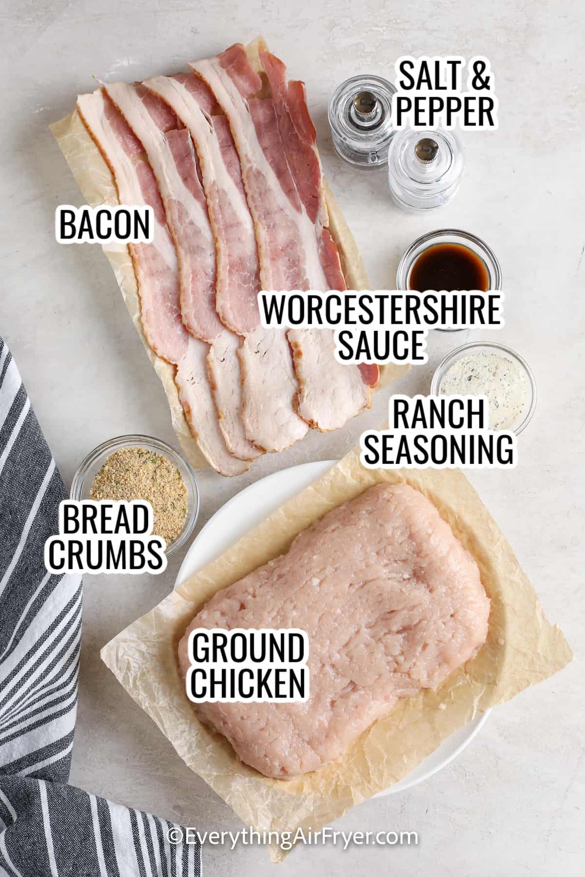 ingredient assembled to make air fryer chicken burgers, including bacon, ground chicken , bread crumbs, ranch seasoning, and worcestershitre sauce