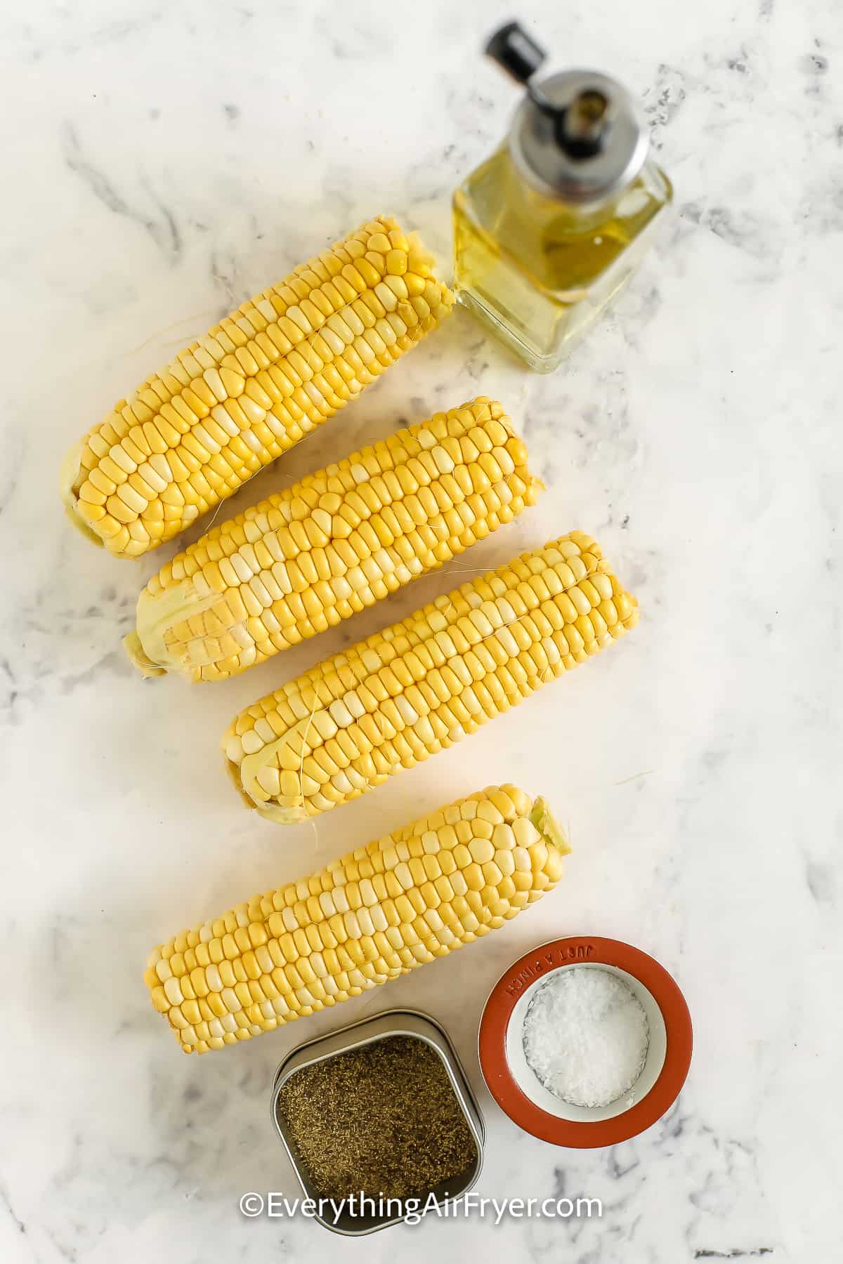 ingredients assembled to make air fryer corn on the cob