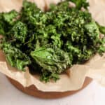 air fryer kale chips in an air fryer tray