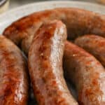 air fryer brats on a plate with text