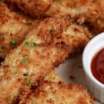 air fryer panko chicken strips on a plate with text