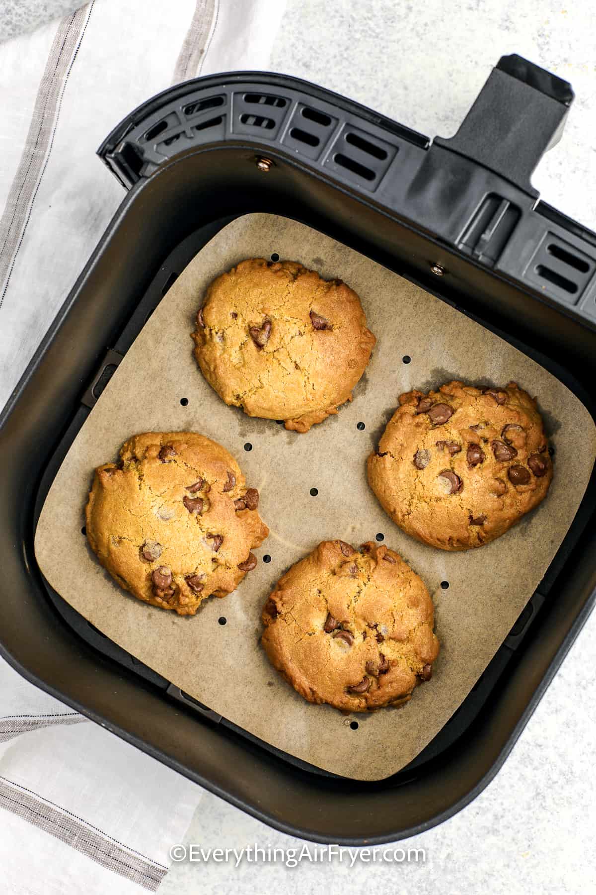 cooked cookies in an air fryer tray