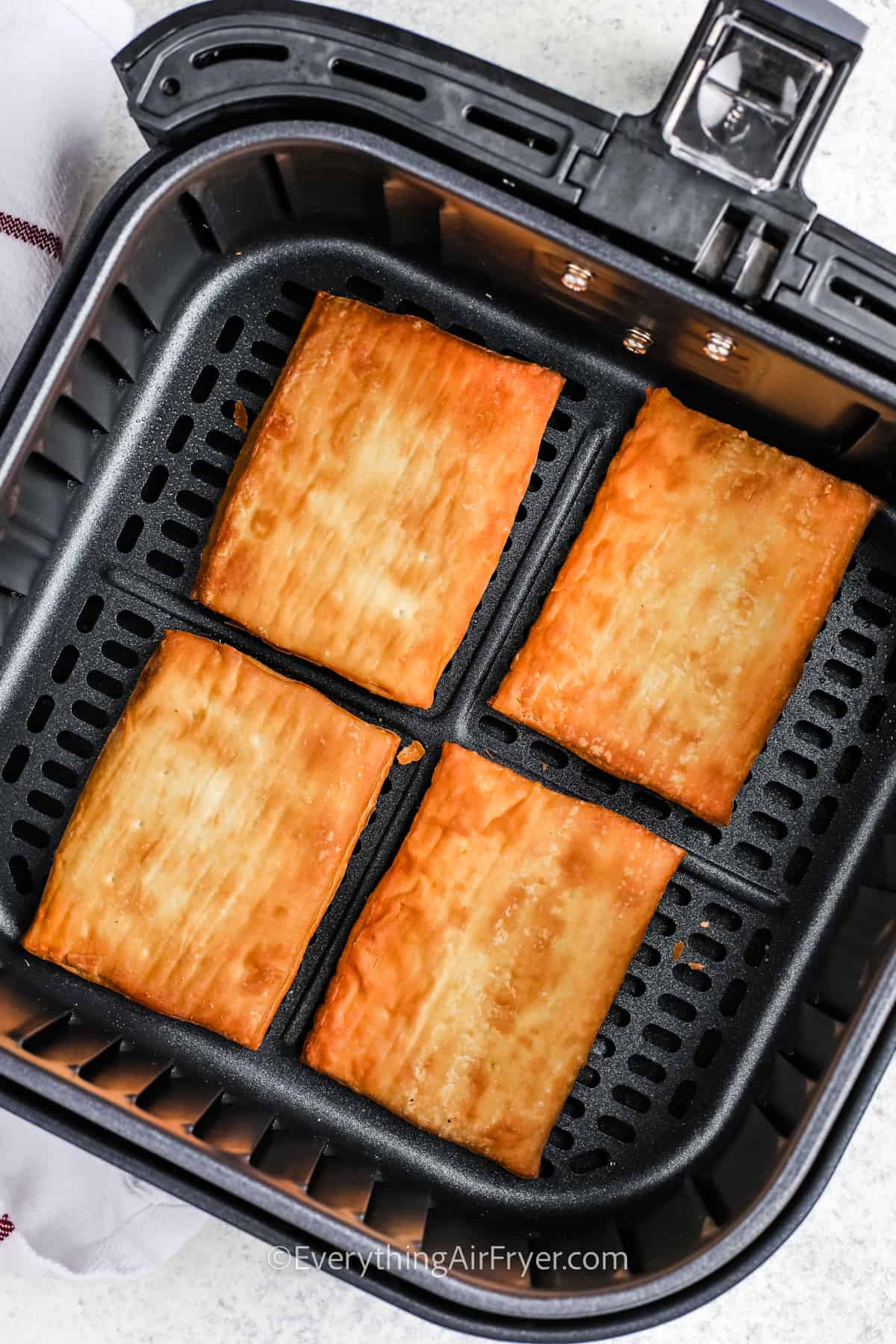 cooked Air Fryer Toaster Strudels in the fryer