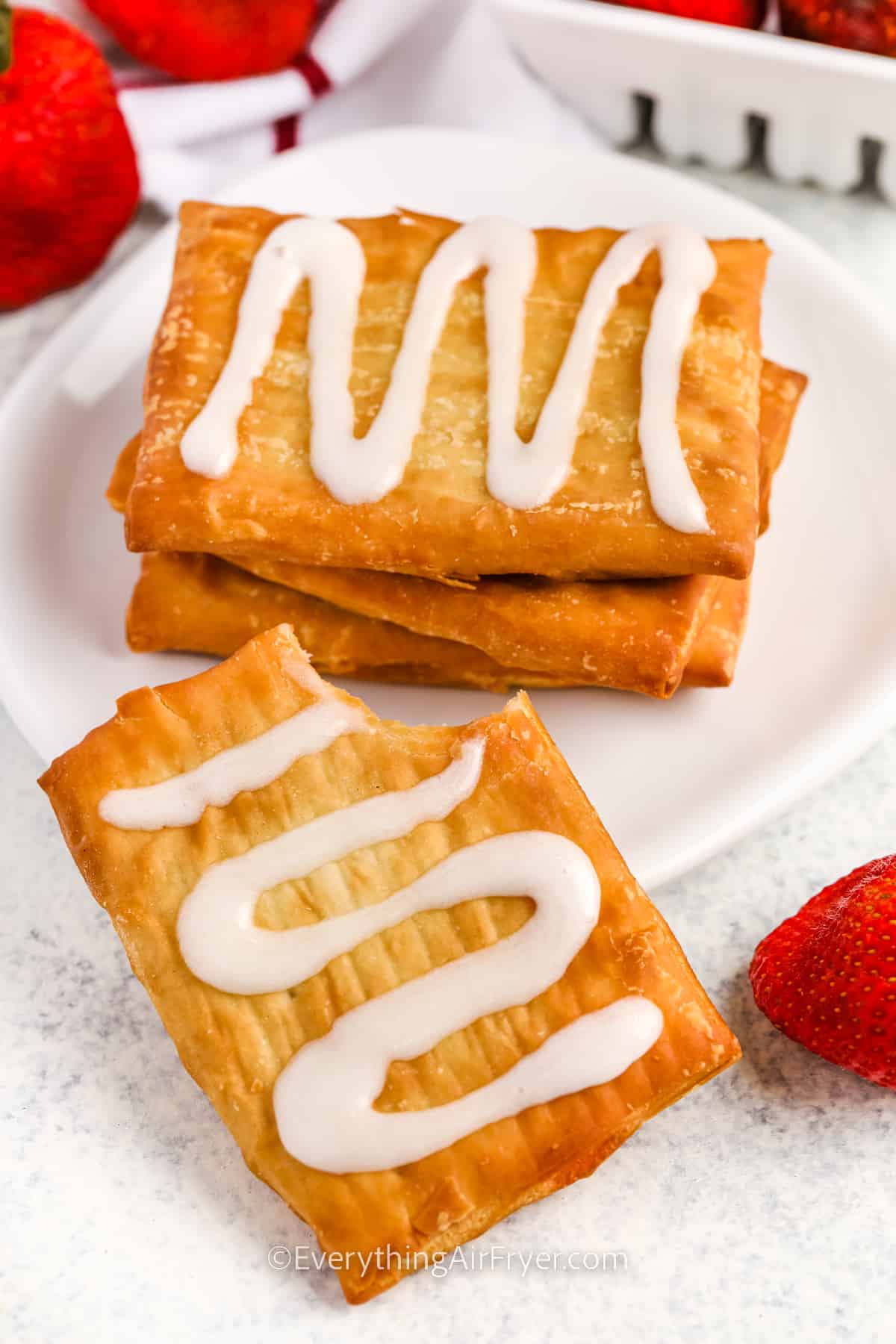 Air Fryer Toaster Strudels with a bite taken out of one