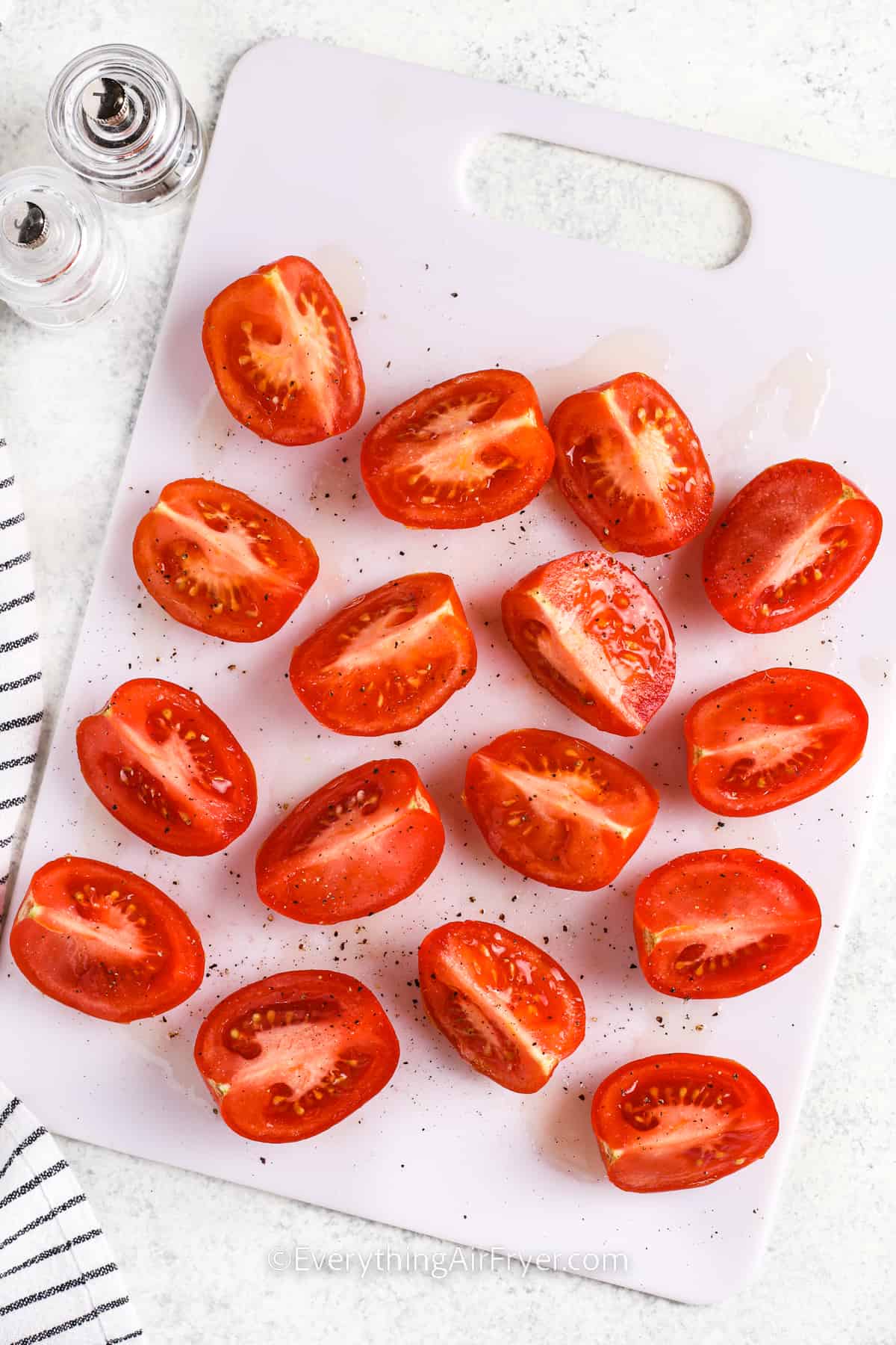 sliced Air Fryer Tomatoes with salt and pepper
