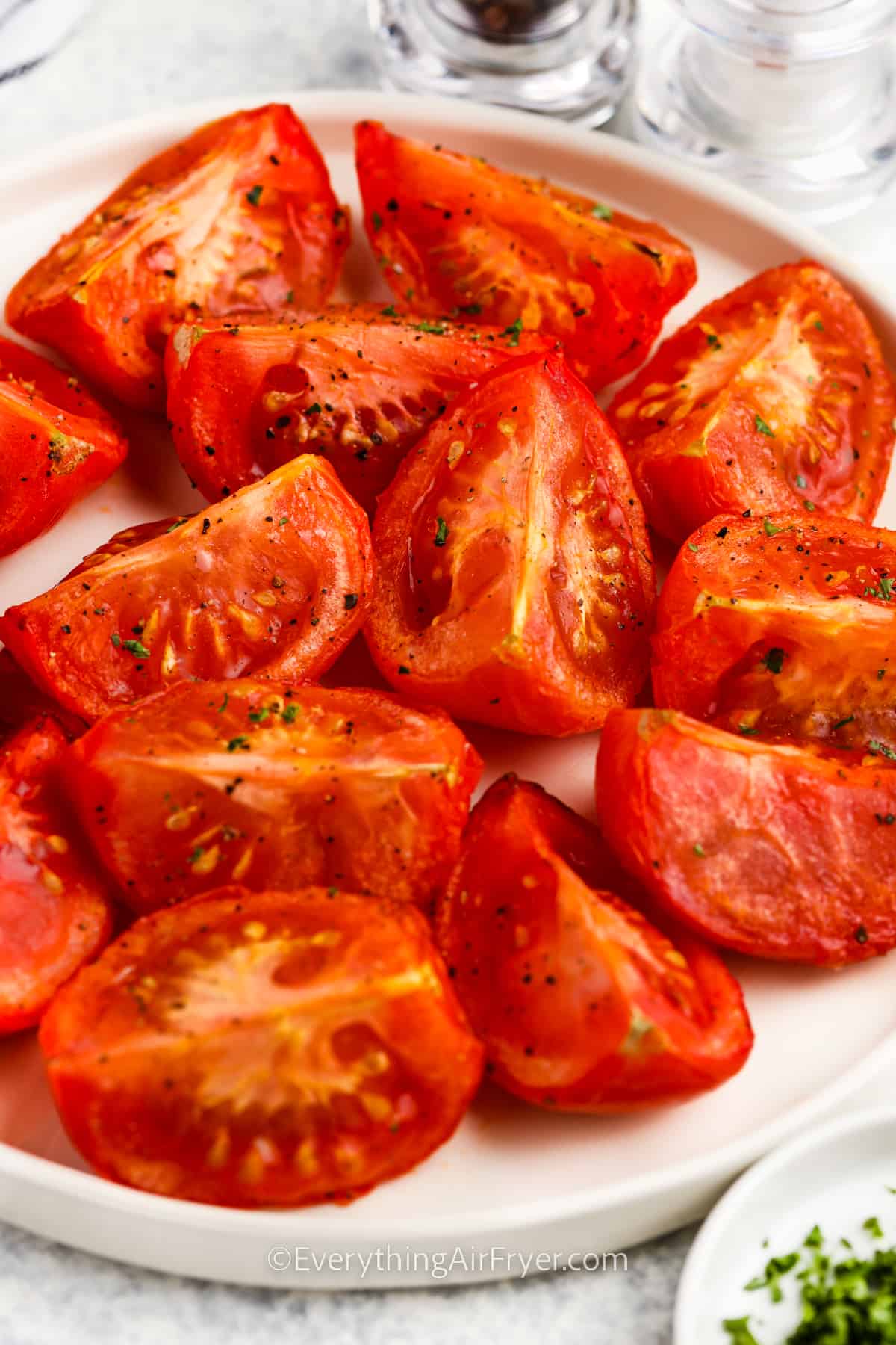 close up of Air Fryer Tomatoes on a plate