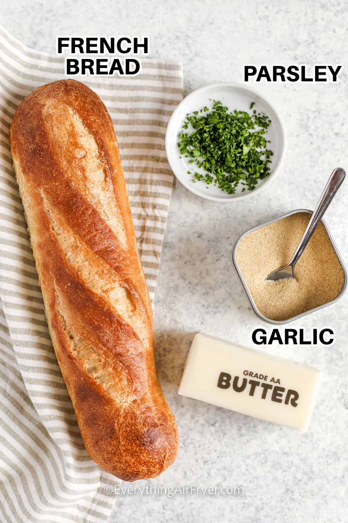French bread , parsley , garlic powder and butter with labels to make Air Fryer Garlic Bread