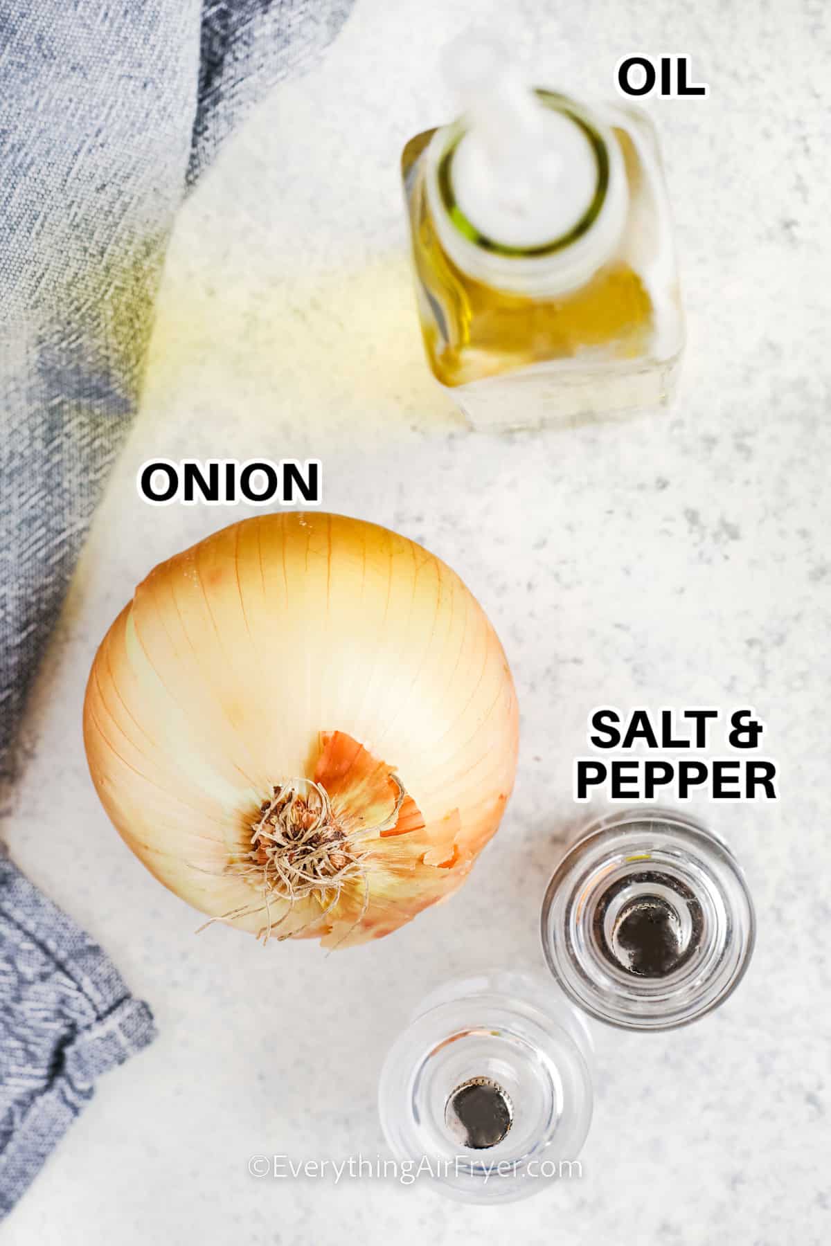 oil , onion and salt with pepper and labels to make Air Fryer Onions