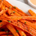 stack of air fryer carrot fries with text