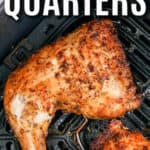 Chicken quarters in an air fryer basket with text