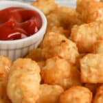 A plate of air fryer tater tots with text