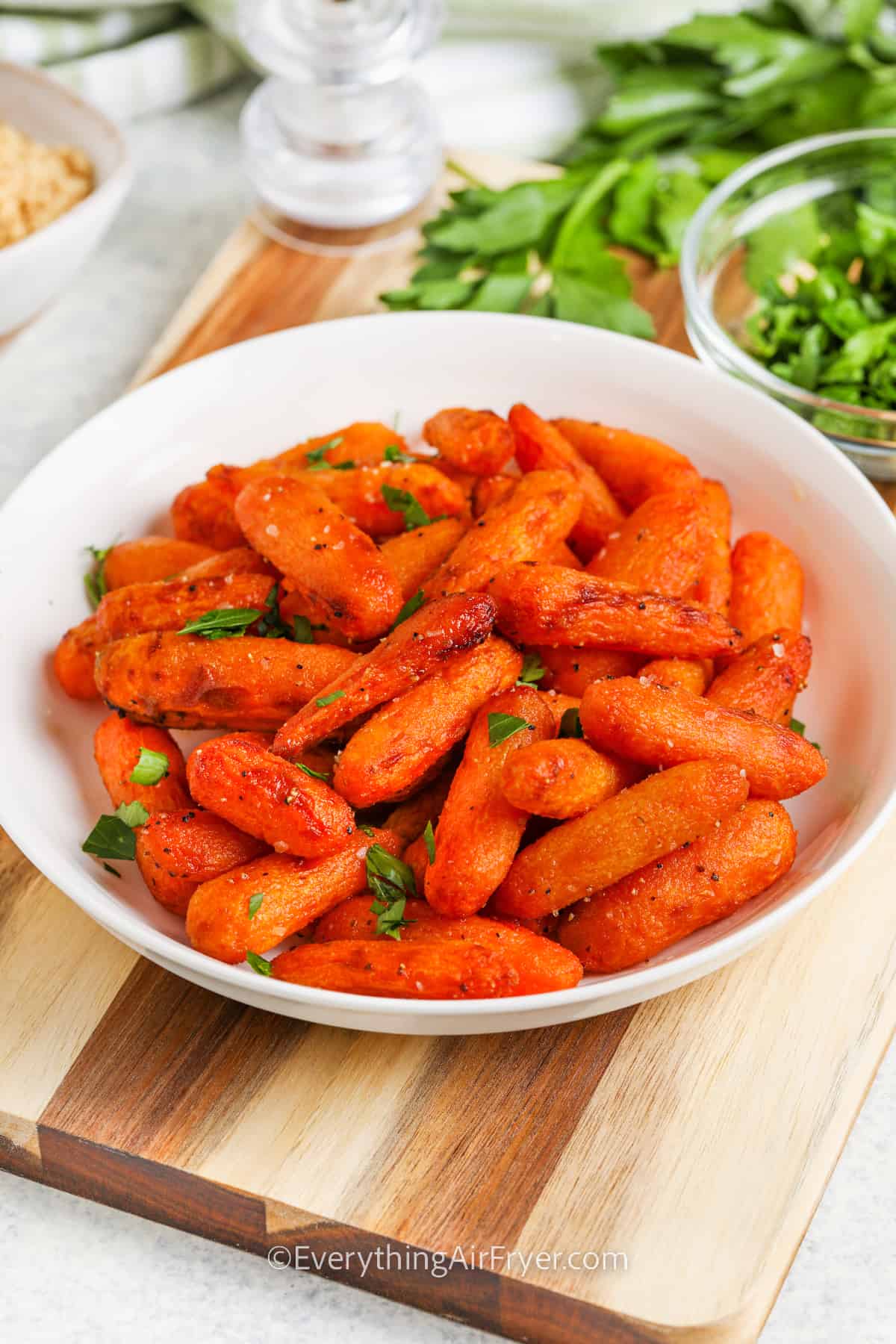 A serving dish with Air Fryer Baby Carrots