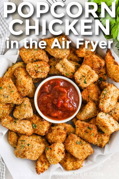 Air Fryer Popcorn Chicken with marinara sauce with a title