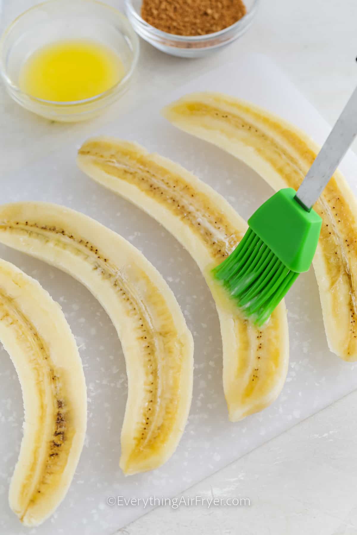 brushing bananas with melted butter