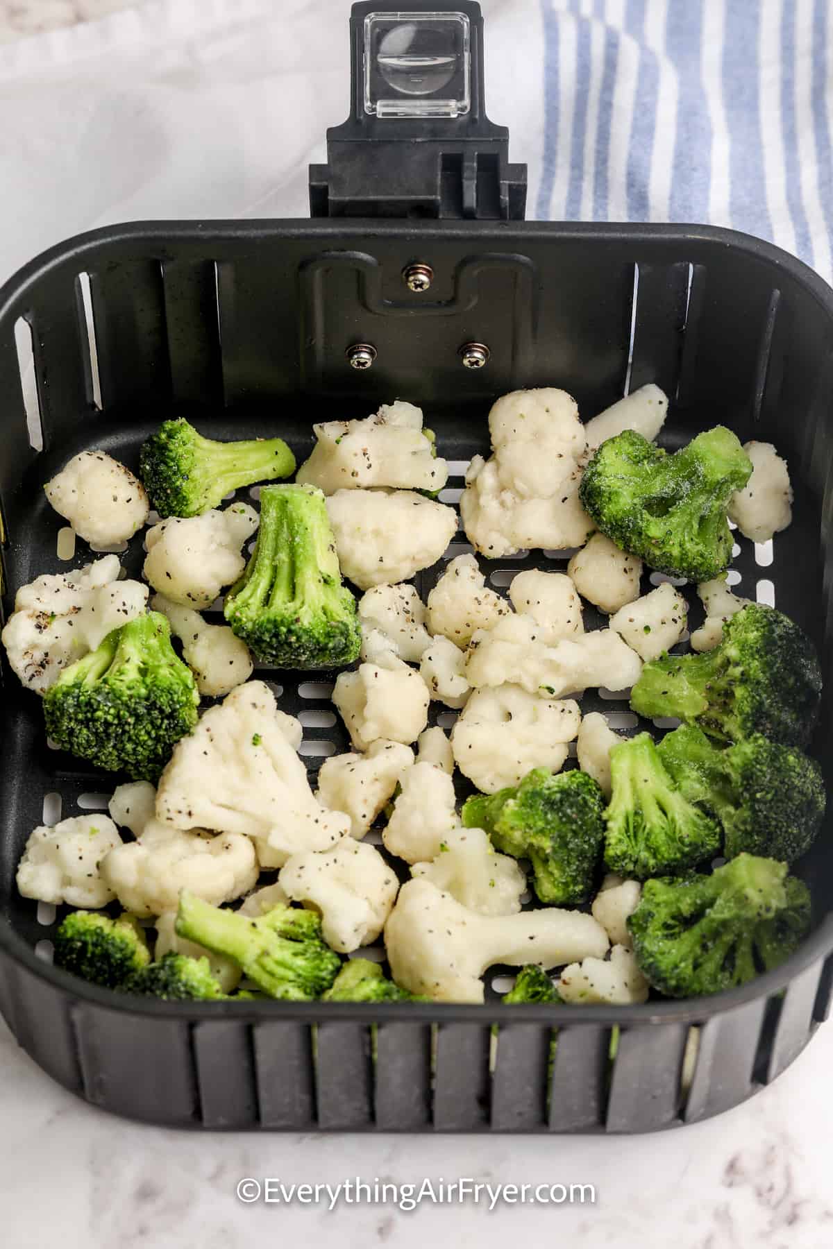 frozen vegetables in an air fryer basket for Air Fryer frozen vegetables