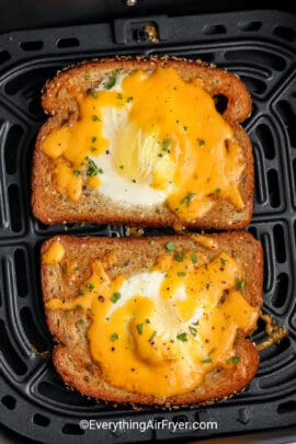 Two Egg in a Hole cooked in an air fryer basket