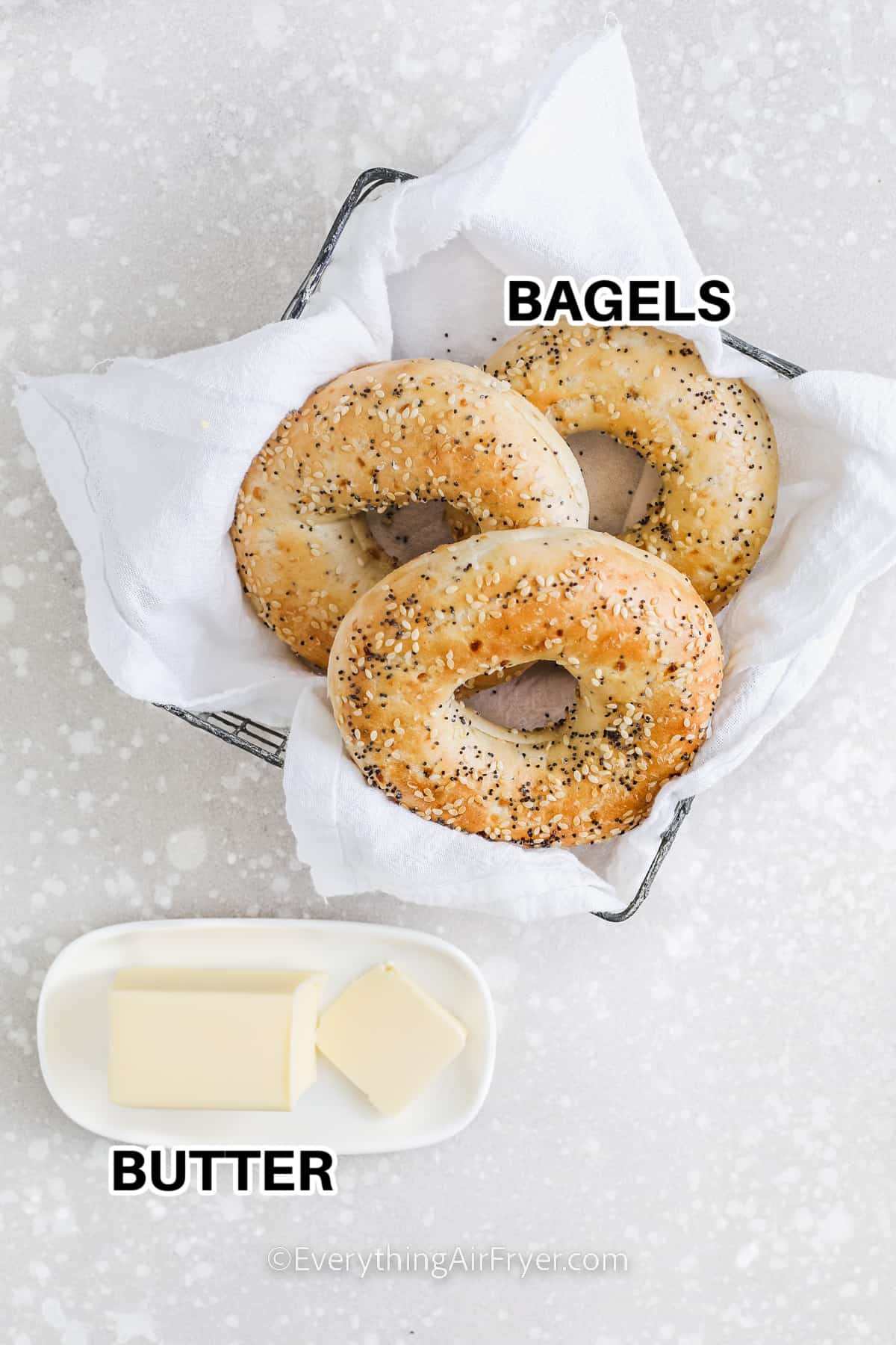 ingredients for bagel in air fryer including bagels and butter