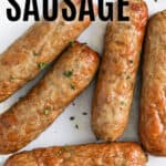 Air fryer chicken sausage on a plate with writing