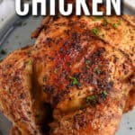 Air Fryer Roast Chicken on a serving plate with a title