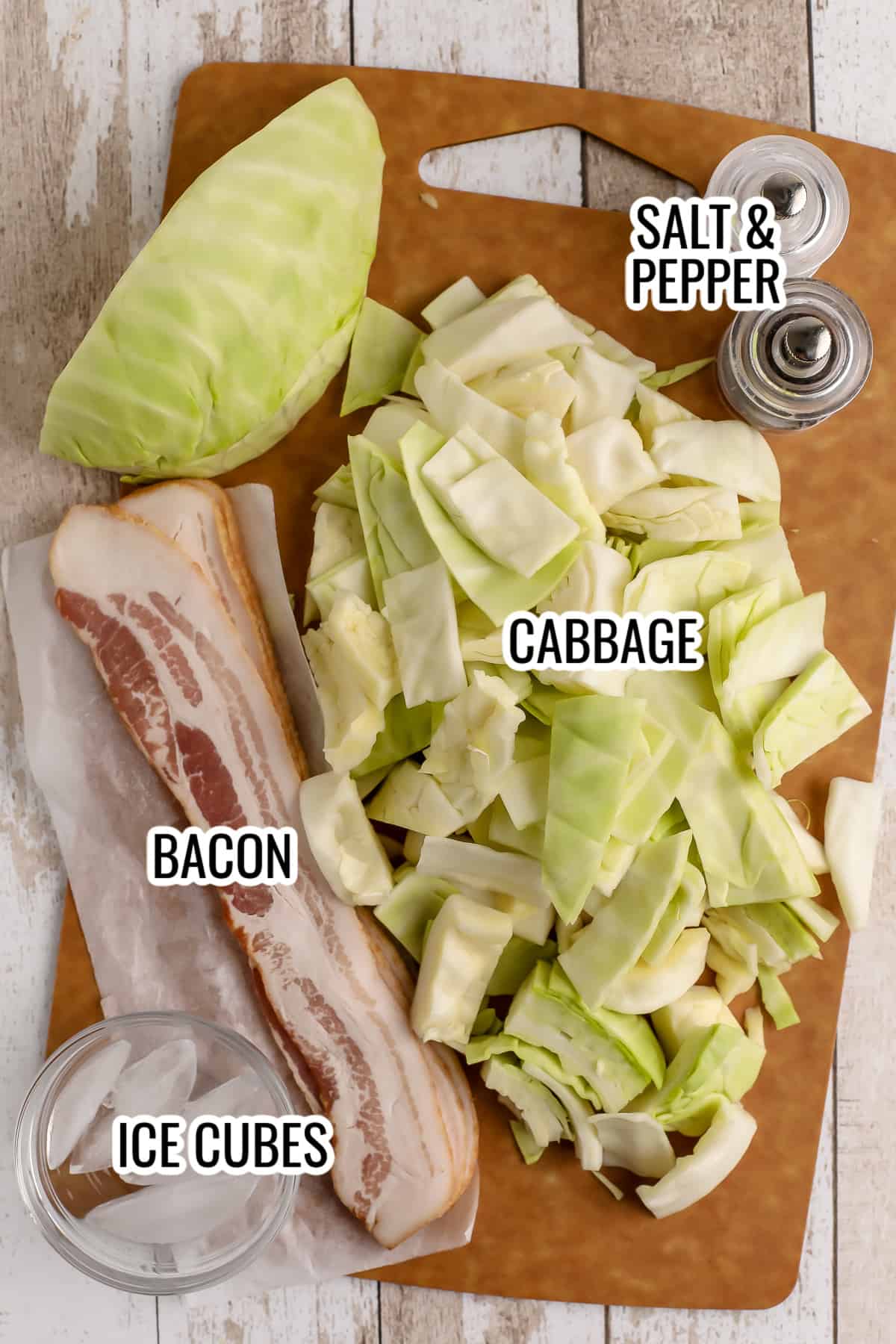 ingredients assembled to make air fryer cabbage, including cabbage, bacon, and ice cubes