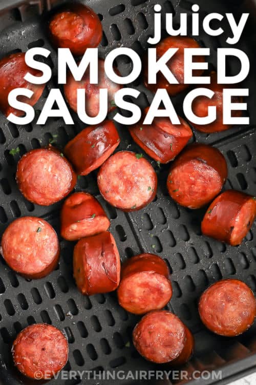 Air Fryer Smoked Sausage in the fryer with writing