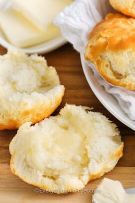 Air Fryer Biscuits topped with butter