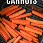 Garlic butter air fryer carrots in an air fryer basket with text
