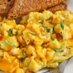 plated scrambled eggs with toast